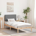 Das Boxspringbett misst 75 x 190 cm in Hellgrau und Braun